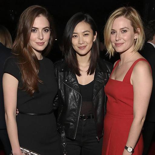 Three Women in Dimly Lit Setting