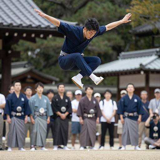 Young Man's Midair Leap Over Crowd