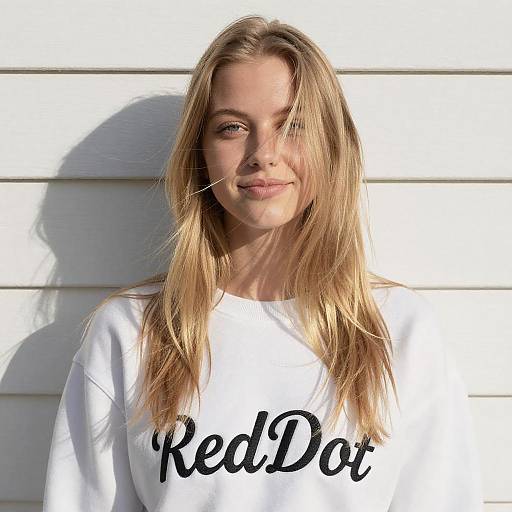 Blonde Woman in White RedDot Sweatshirt
