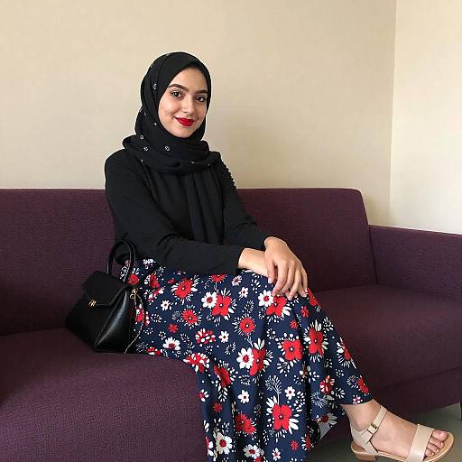 Young Woman in Patterned Hijab and Floral Skirt