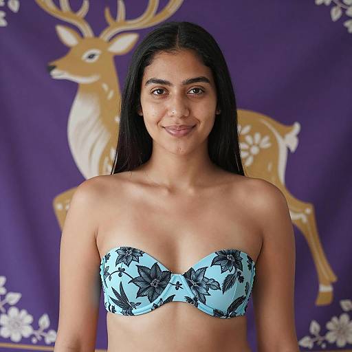 Smiling Woman in Floral Bra with Tapestry