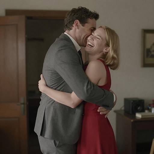 Joyful couple hugging indoors