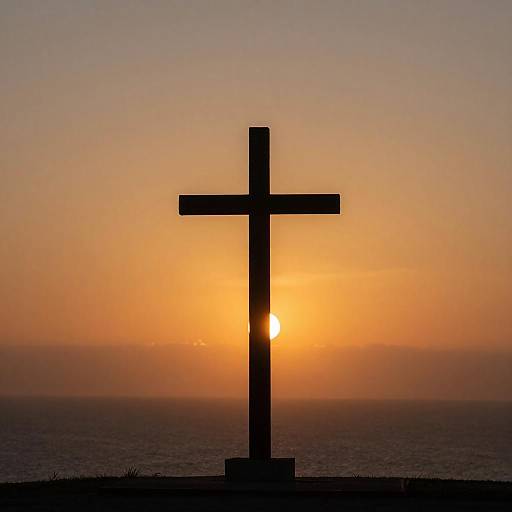 Silhouetted Cross Against Vibrant Sunset