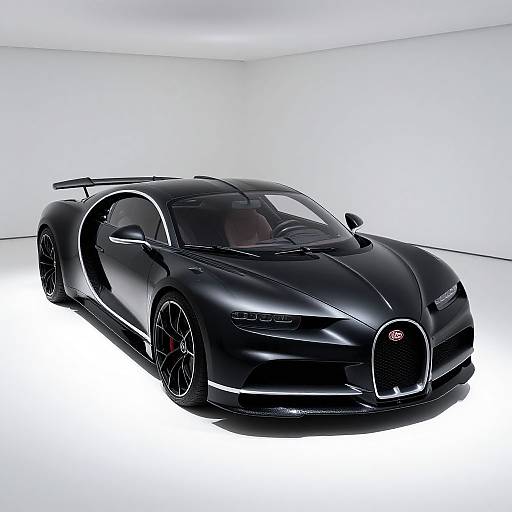 Photograph of a sleek, black, high-performance sports car with glossy finish, large black wheels, and futuristic design, set against a bright white,