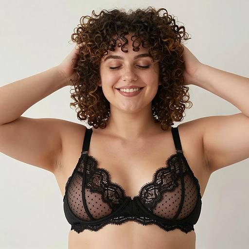 Smiling Curly-Haired Woman in Black Lace Bra