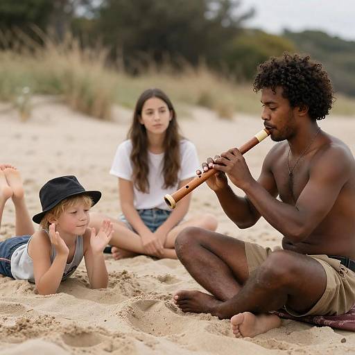 Family Beach Scene with Musical Moment