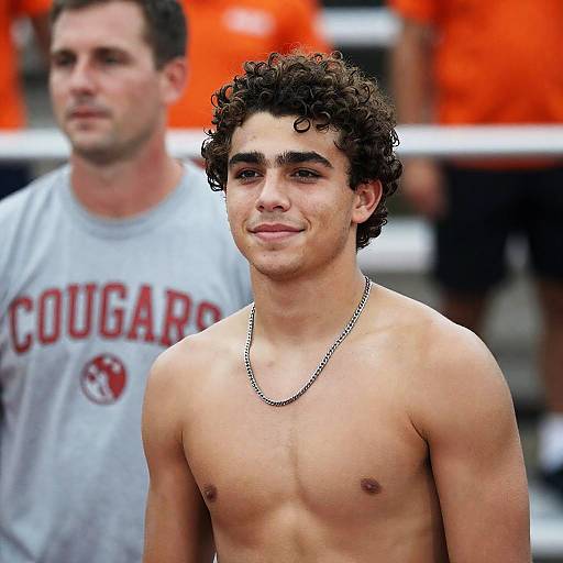 Shirtless Young Man with Curly Hair and Silver Chain