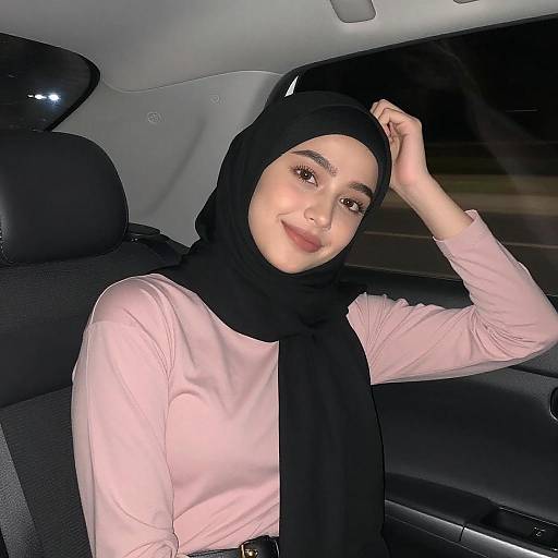 Young Woman in Black Hijab at Night