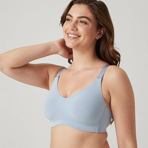 Smiling Woman in Light Blue Bra