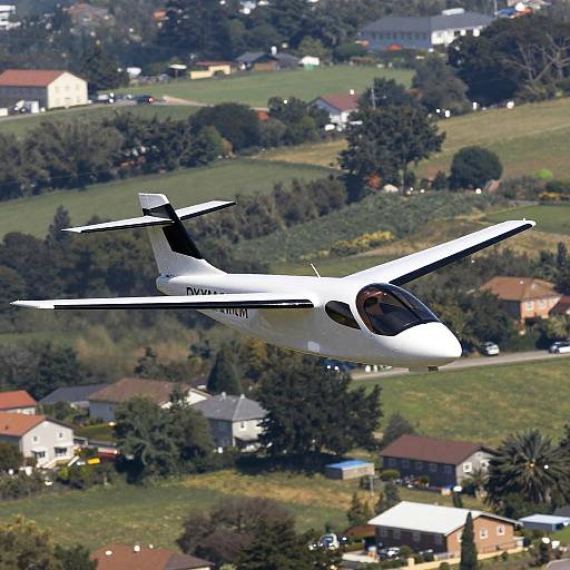 Electric Aircraft Over Suburban Hills