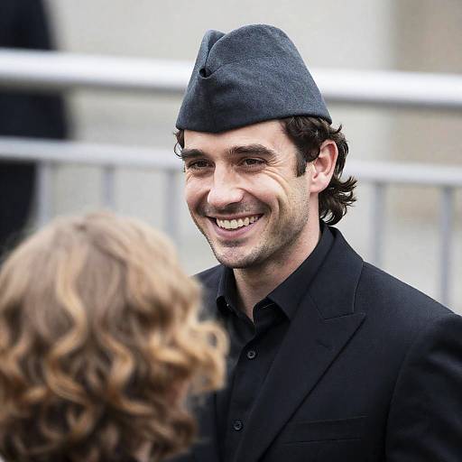 Smiling Man in Military Cap Outdoors