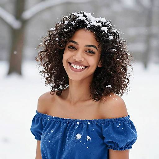 Joyful Woman in Snowy Winter Portrait
