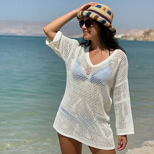 Smiling Woman in Stylish Crochet Cover-Up