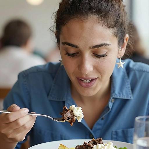 Contemplative Woman Enjoying a Meal