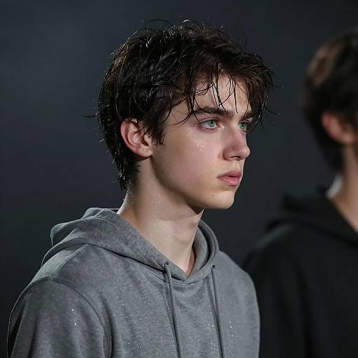 Determined Young Man in Smoky Setting