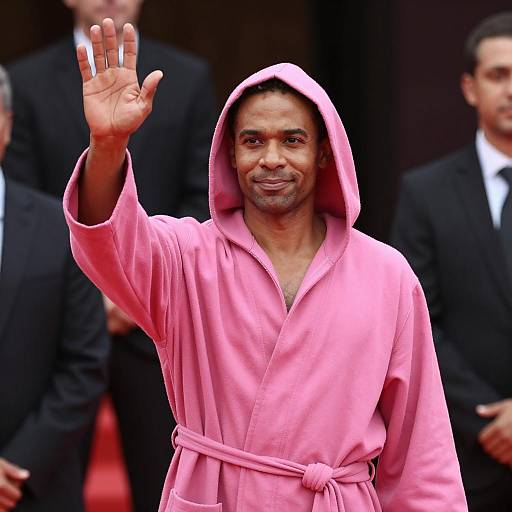 Vibrant Figure Among Shadowy Presence