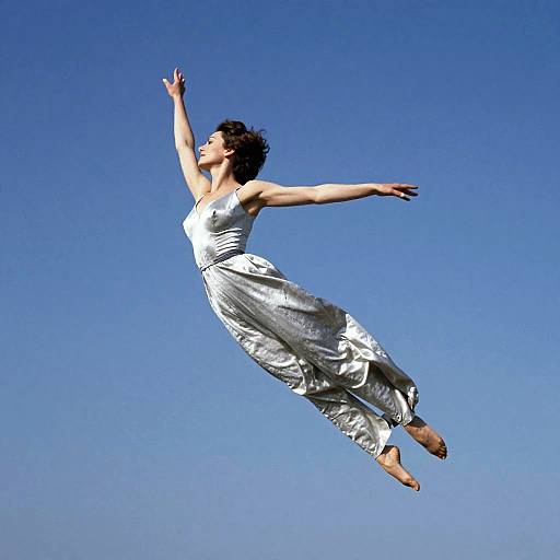 Woman in Platinum Gown Flying
