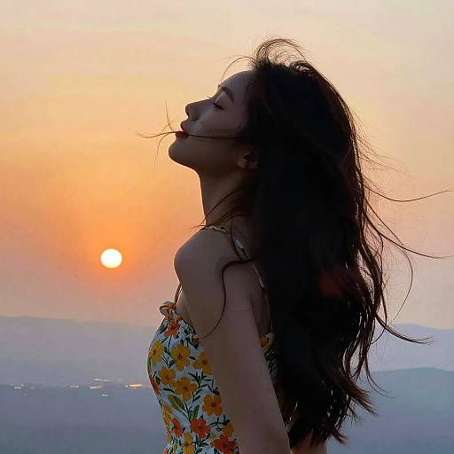 Woman Enjoying Sunset with Flowing Hair