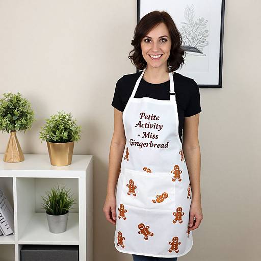 Photograph of smiling woman with short dark hair, wearing black shirt and white 