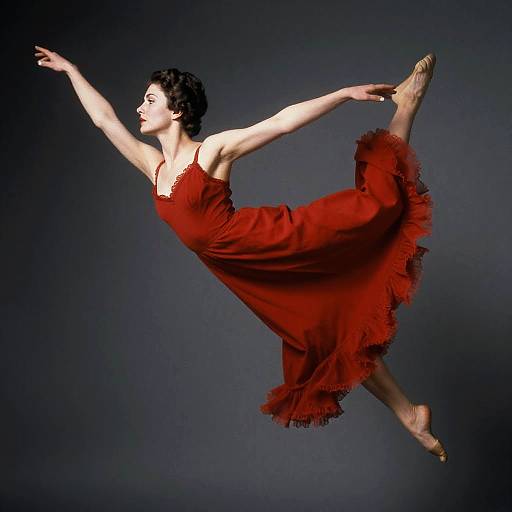 Ballerina in Crimson Lyrical Dress Leaping