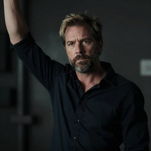 Intense Middle-Aged Man with Raised Arm