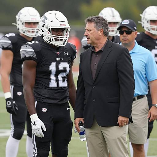 American Football Player and Coach on Field