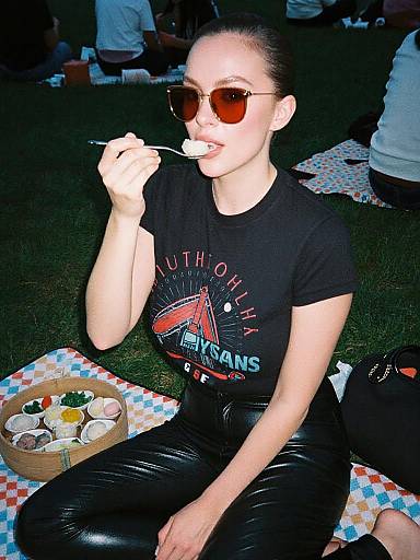 Stylish Woman Enjoying Dim Sum Picnic