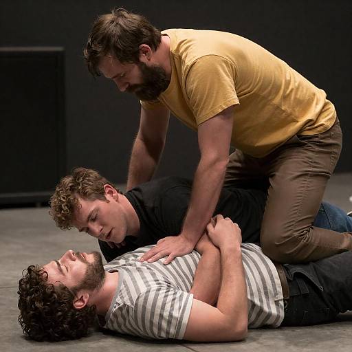 Tense Confrontation Among Three Men