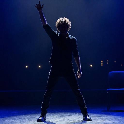 Silhouetted Rock Musician in Blue Light