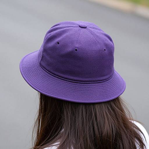 Woman in Purple Rain Hat