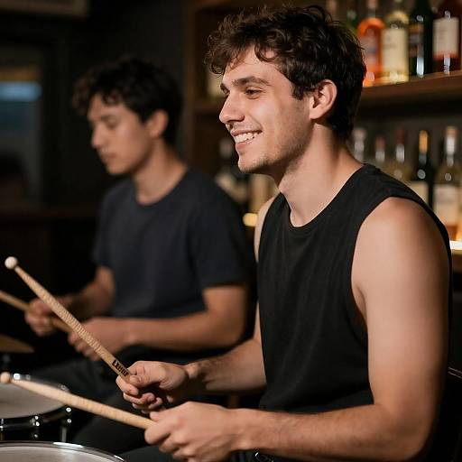 Two Musicians Captured in Dim Bar