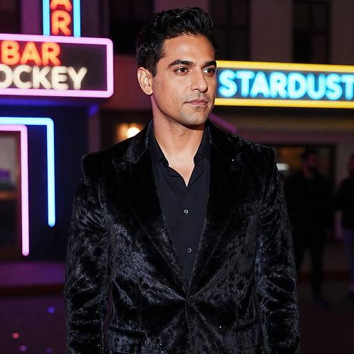 Stylish Man in Neon-lit Bar Scene