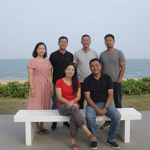 Casual Beach Gathering on White Bench