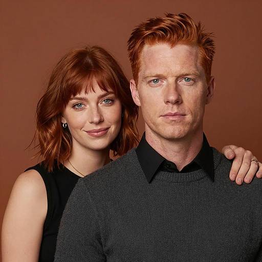 Couple Portrait with Red Hair and Smiles