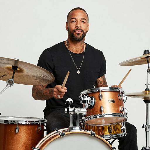 Male Drummer Playing Drum Set