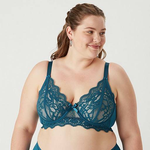 Smiling Plus-Sized Woman in Teal Lace Bra
