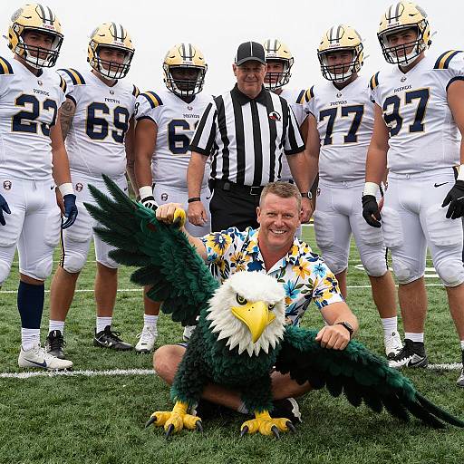 Football Team with Referee and Man Holding Eagle Costume