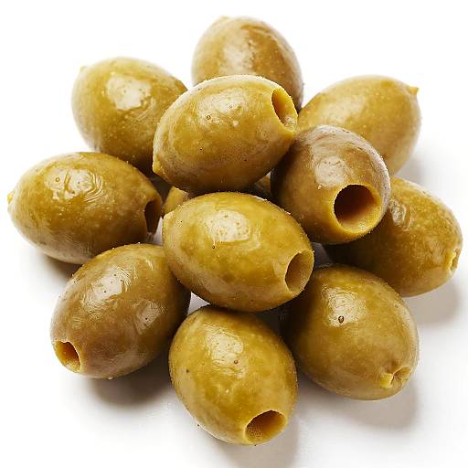 Scattered Green Olives on White
