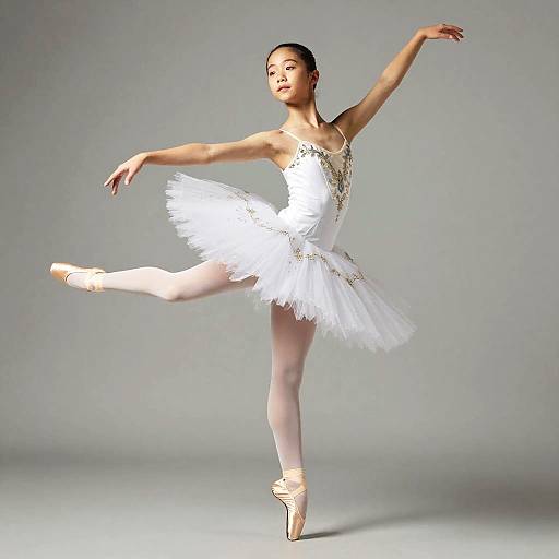 Young Asian Ballet Dancer in White Tutu