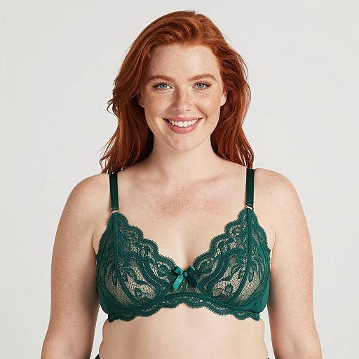 Smiling Redhead Woman in Green Lace Bra
