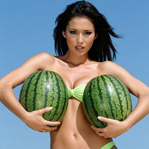 Digital artwork of an Asian woman with black hair, wearing a green bikini top, holding two watermelons over her large breasts, against a bright blue