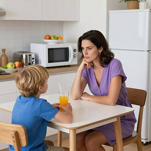 Intimate Kitchen Scene with Woman and Boy