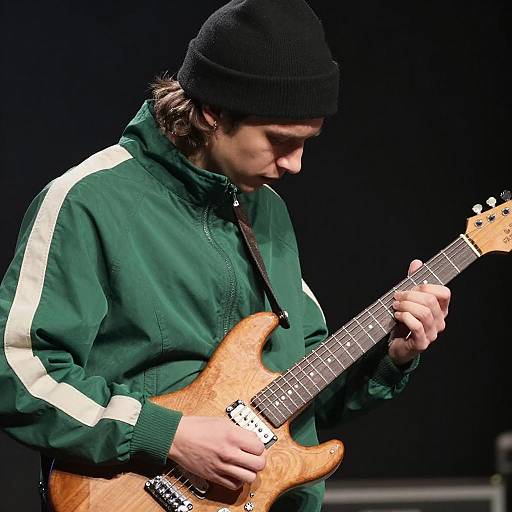 Young Musician Playing Electric Guitar