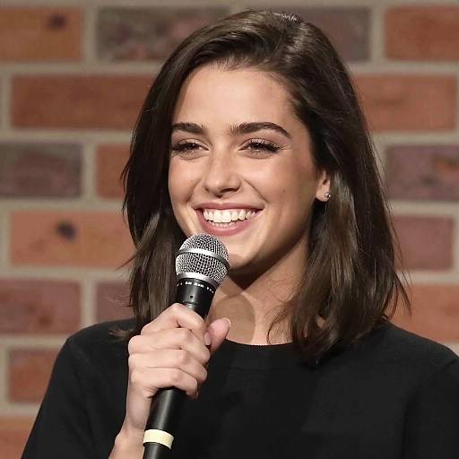 Joyful Woman Singing with Microphone