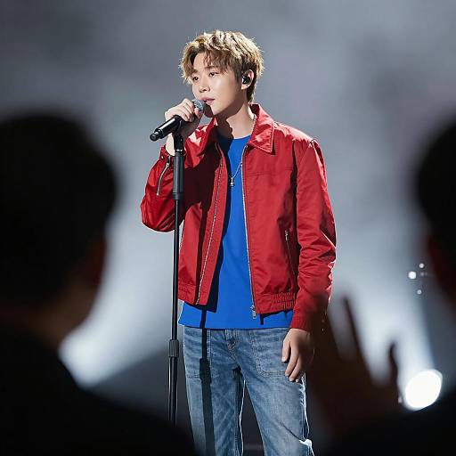 Focused Male Singer on Stage Performance