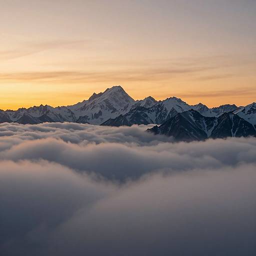 Sunset Over Snow-Capped Mountain Peaks