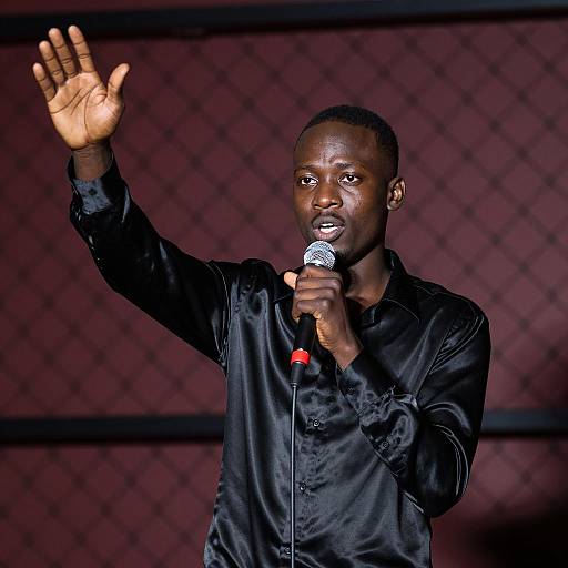 Young Man Speaking with Microphone