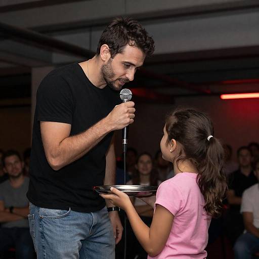 Man With Microphone and Young Girl