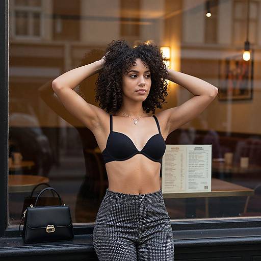 Curly-Haired Woman in Restaurant Window