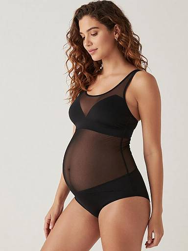 Romantic Maternity Lingerie Studio Portrait